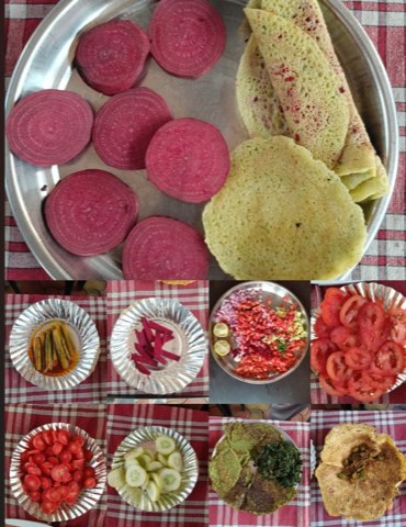Plates from a nutrition demonstration — beetroot, tomato, cucumber and green vegetable preparations for iron-rich diets.